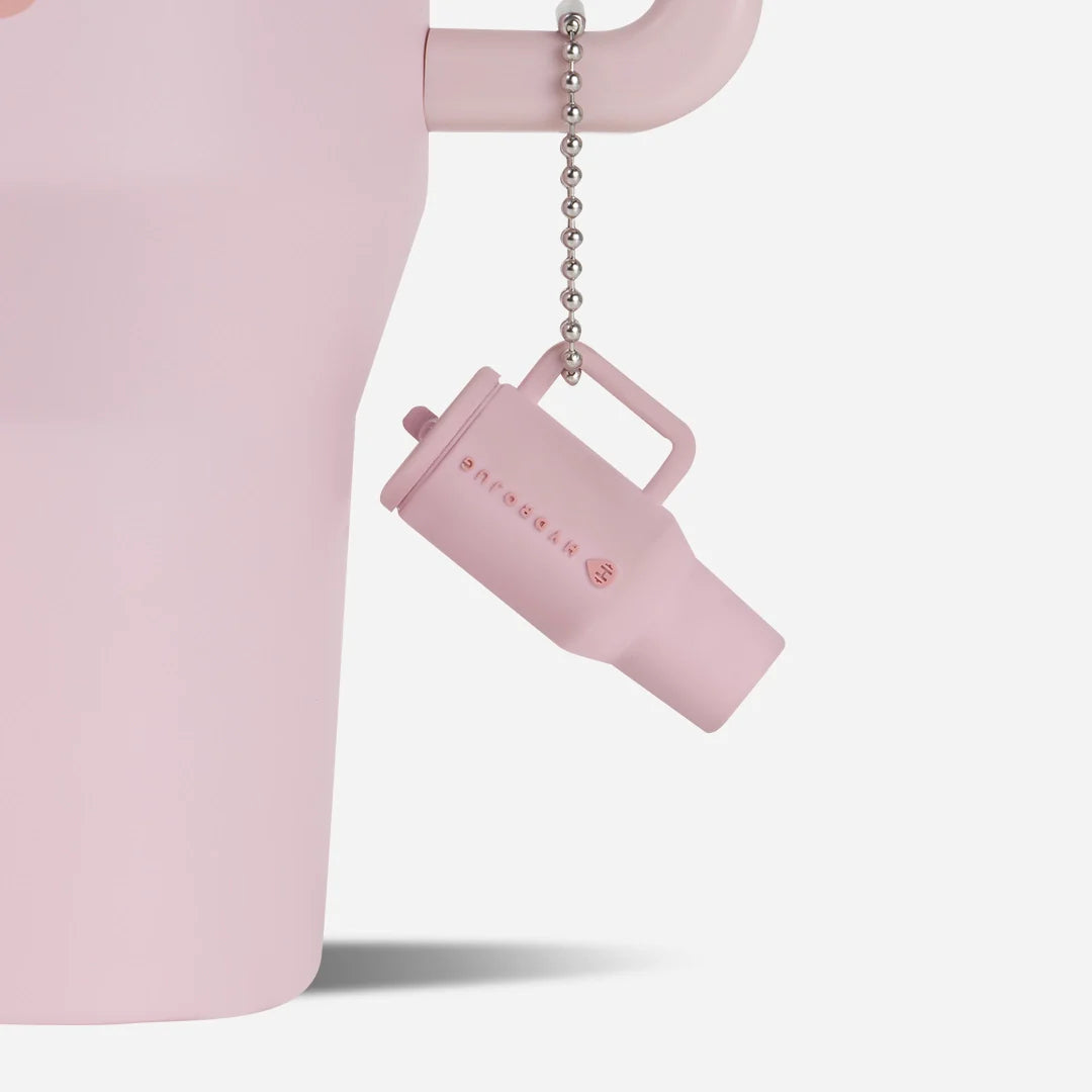 traveler-keychain-q7 Web-TravelerKeychainPhotos-PinkSand2.webp